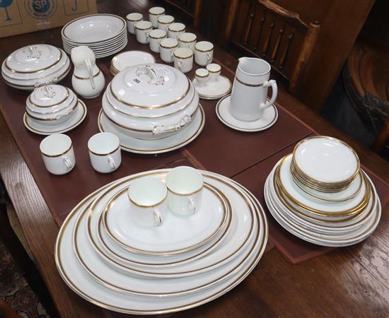 A Hammersley part dinner service with a gilt key pattern border